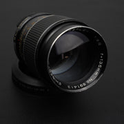 Chinon Auto Reflex 135mm f/2.8: teleobiettivo manuale M42 con ampia apertura f/2.8, ideale per ritratti e fotografia naturalistica. Immagini nitide e bokeh morbido.