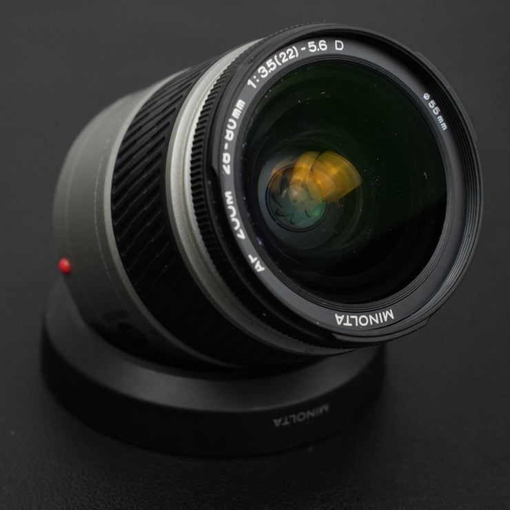 Minolta AF Zoom 28-80mm f/3.5-5.6 D: obiettivo autofocus versatile per fotocamere Sony A-mount, ideale per paesaggi, ritratti e scatti quotidiani.