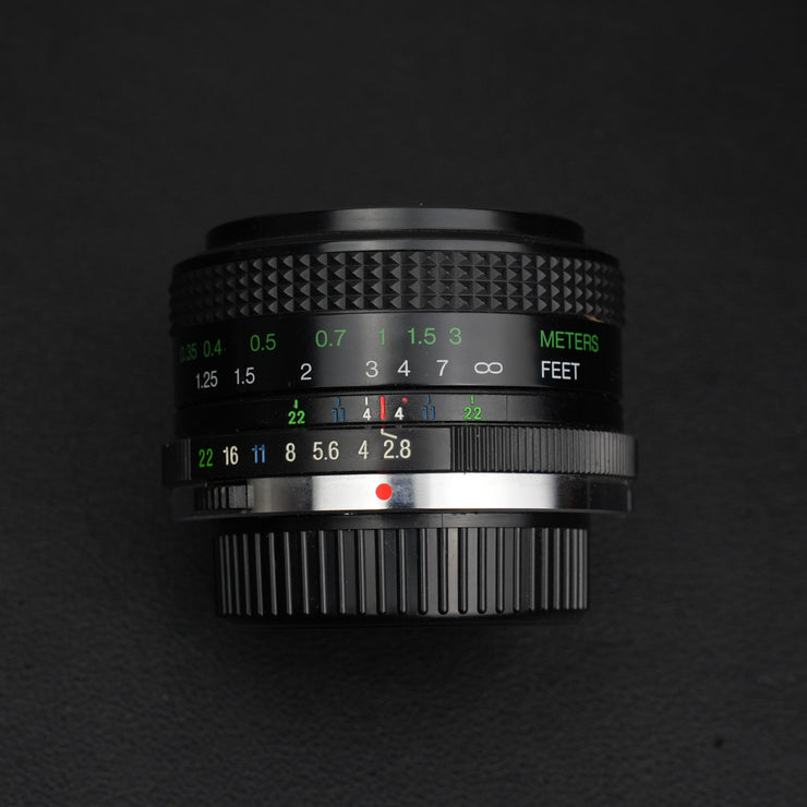 Vivitar MC 28mm f/2.8: obiettivo manuale compatto con trattamento MC, ideale per paesaggi e street photography, prestazioni eccellenti e design vintage.