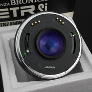 Zenzanon PE 75mm f/2.8: obiettivo manuale per fotocamere Bronica ETR, con apertura f/2.8, ideale per ritratti e scatti ravvicinati. Immagini nitide e bokeh morbido.